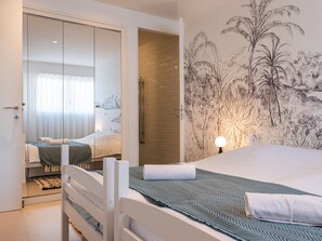 3 slaapkamers, een strijkplank/strijkijzer, wifi, beddengoed