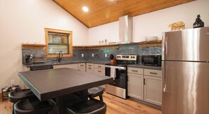 Fridge, microwave, oven, stovetop - Bear Cub Cabin - 2 Bedroom, Sleeper Sofa, Outdoor Lounge & Hot Tub (Roan Mountain)