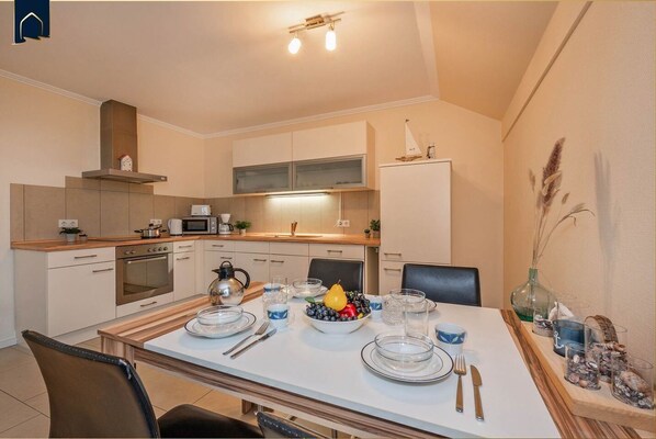 Imagen sin descripción, 1 de 34, botón