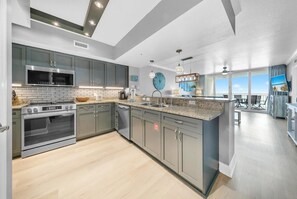 Condo, Multiple Beds (Emerald Beach 1036 - Turquoise Turtle) | Private kitchen | Oven, toaster - Emerald Beach 1036 - Turquoise Turtle (Panama City Beach)