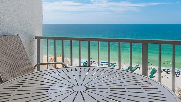 A balcony with a view of the ocean and beach. - Leeward Key 904 (Miramar Beach)