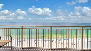 A balcony with a view of a beach and the ocean. - Sterling Reef 1203 (Panama City Beach)