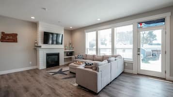 Smart TV, fireplace, foosball, books