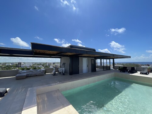 New Luxury Condo in Playa Del Carmen! Off 5th Ave and short walk to the beach!