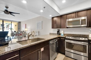Condo, Multiple Beds (East Pass 101) | Private kitchen | Oven, toaster