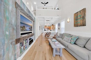 House, Multiple Beds (Claire N' Bea by the Sea) | Living area | TV - Claire N' Bea by the Sea (Santa Rosa Beach)