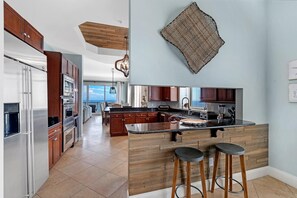 Condo, Multiple Beds (Indigo East 2104 Penthouse) | Private kitchen | Oven, toaster, paper towels - Indigo East 2104 Penthouse (Pensacola)