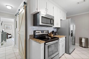 Condo, 1 King Bed with Sofa bed (Shore Break) | Private kitchen | Oven, toaster, paper towels - Shore Break (Pensacola)