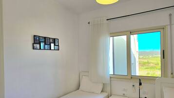 Family Penthouse, Multiple Bedrooms, 2 Bathrooms (Perla Penthouse) | 3 bedrooms, free WiFi, bed sheets