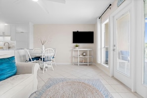 Condo, Multiple Beds (Grand Caribbean East 311) | Living area | TV