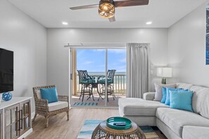 Condo, Multiple Beds (Riviera Dunes 302) | Living area | TV