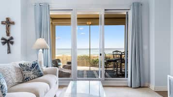 Condo, Multiple Beds (Beach Colony West 1B) | Living area | TV