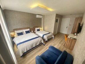 Deluxe Quadruple Room | Minibar, in-room safe, iron/ironing board, free WiFi - ERA PALACE HOTEL (Istanbul)