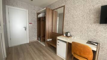 Deluxe Quadruple Room | 1 bedroom, minibar, in-room safe, iron/ironing board