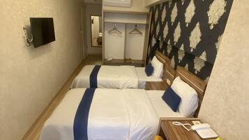 Standard Room | 1 bedroom, minibar, in-room safe, iron/ironing board