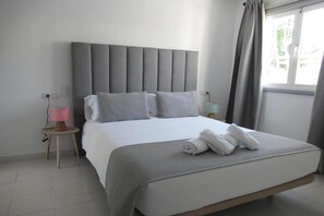 2 quartos, ferros/tábuas de passar roupa, Wi-Fi de cortesia