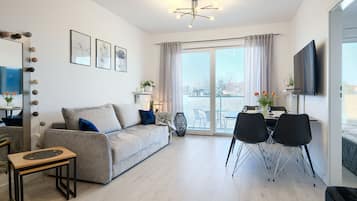 Apartment (5) | Living area | Flat-screen TV