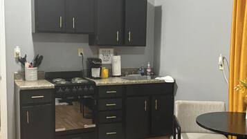 Fridge, microwave, coffee/tea maker, toaster
