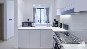 Apartment (1 Bedroom) | Private kitchen - Stylish One-bedroom With Balcony in JVC (Dubai)