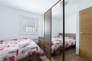 Family House, Multiple Bedrooms, Mountainside (Cozy Apartment Bovec) | 2 bedrooms, desk, free WiFi, bed sheets