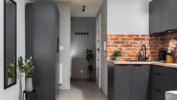 32. Felicjanek | Tabla de planchar con plancha, cunas, wifi gratis y ropa de cama