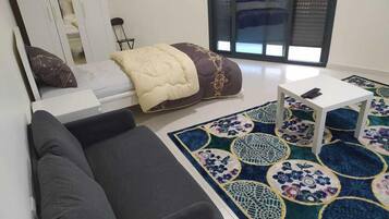 Chambre Simple Deluxe | Draps en coton égyptien, literie de qualité supérieure, surmatelas