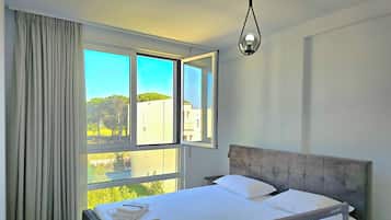 Family Apartment, 2 Bedrooms (Cozy Apartment in San Pietro Resort) | 2 bedrooms, free WiFi, bed sheets