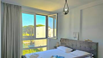 Family Apartment, Multiple Bedrooms (Cozy Apartment in San Pietro Resort) | 2 bedrooms, free WiFi, bed sheets