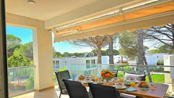 Family Apartment, 2 Bedrooms, Balcony (Cozy Apartment in San Pietro Resort) | Outdoor dining
