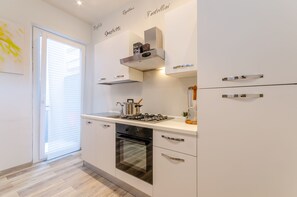 Superior Apartment | Private kitchen | Full-sized fridge, microwave, high chair, cookware/dishes/utensils - Appartamenti Mar Y Sol (Gabicce Mare)