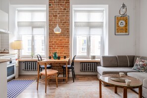Comfort Apartment | Living room | 37-inch flat-screen TV with digital channels
