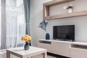8. Blossom - Old Town Residence | Living area | Flat-screen TV - Blossom - Old Town Residence (Kraków)