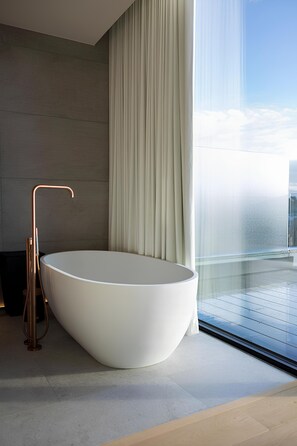 Luxury Apartment | Bathroom | Separate tub and shower, rainfall showerhead, hair dryer, slippers - Duplex Penthouse with Breathtaking Views (Brussels)