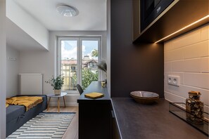 C. Studio Smart Apartments