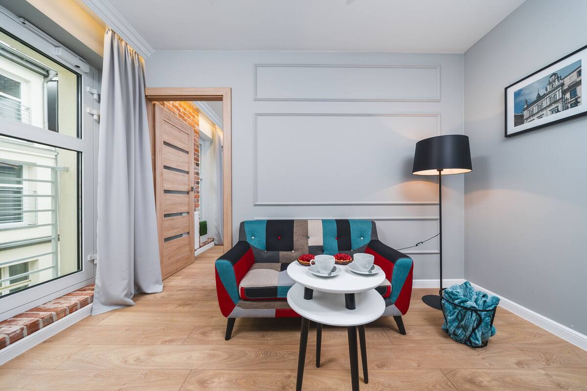 7. One Bedroom Apartment - Saint Florian's Suites | Sala de estar | Televisión de pantalla plana