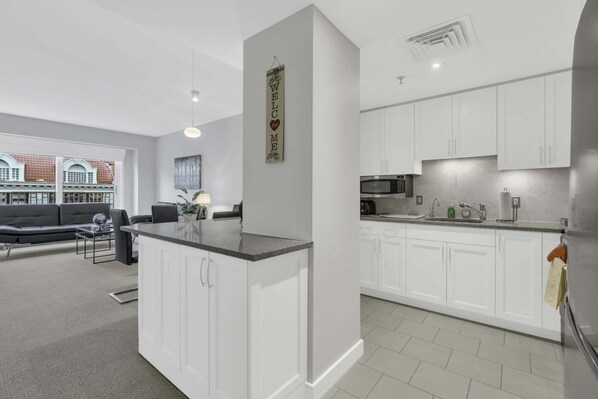 Apartment, 1 Bedroom | Private kitchen | Fridge, oven, coffee/tea maker, toaster