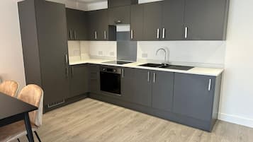 Apartment | Private kitchen | Fridge, microwave, oven, stovetop