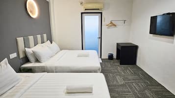 Standard Triple Room | Desk, iron/ironing board, free WiFi, bed sheets