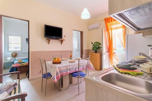 Apartamento standard, vários quartos (Casa Lory 2 Cosy near the sea) | Opções para refeição