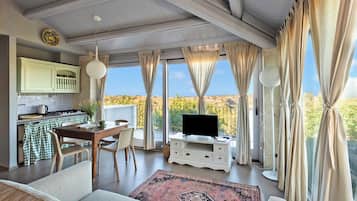 Standard Villa, Multiple Bedrooms, Mountainside (Villa Iris) | Living area | 21-inch Smart TV with cable channels