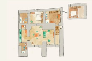 Un plan d’étage d’hôtel comprenant plusieurs chambres, un espace repas et une petite cuisine.