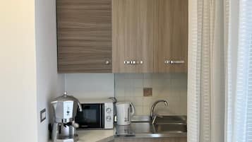 Mini-fridge, microwave, espresso maker, coffee/tea maker