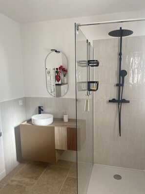 Shower, hair dryer, towels, soap
