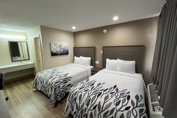 Blackout drapes, WiFi (free), bed sheets