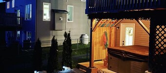 The Governor's Suite - An executive oasis featuring a hot tub, fire pit and BBQ!