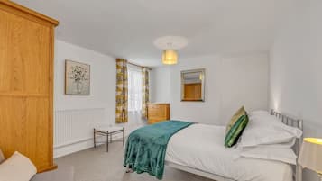 1 bedroom, desk, iron/ironing board, travel crib