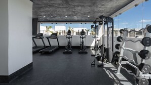 A gym with treadmills, elliptical machines, and weightlifting equipment. - 2 BD w/ Private Plunge Pool + Terrace (Tulum)
