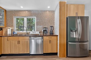 Coffee/tea maker, fridge, microwave, oven