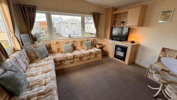 Chalet | Área de sala de estar | Chimenea