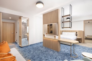 Suite Élite, 1 très grand lit et 1 canapé-lit, non-fumeurs, vue ville | Coffres-forts dans les chambres, chambres insonorisées